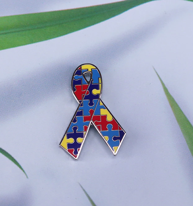 Pin Autismus Awarness Schleife